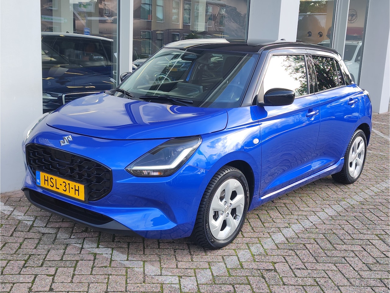 Suzuki Swift - 1.2 SELECT SMART HYBRID AUTOMAAT Carplay/Android | Dodehoeksens. | Adaptive Cruise | Stoel - AutoWereld.nl