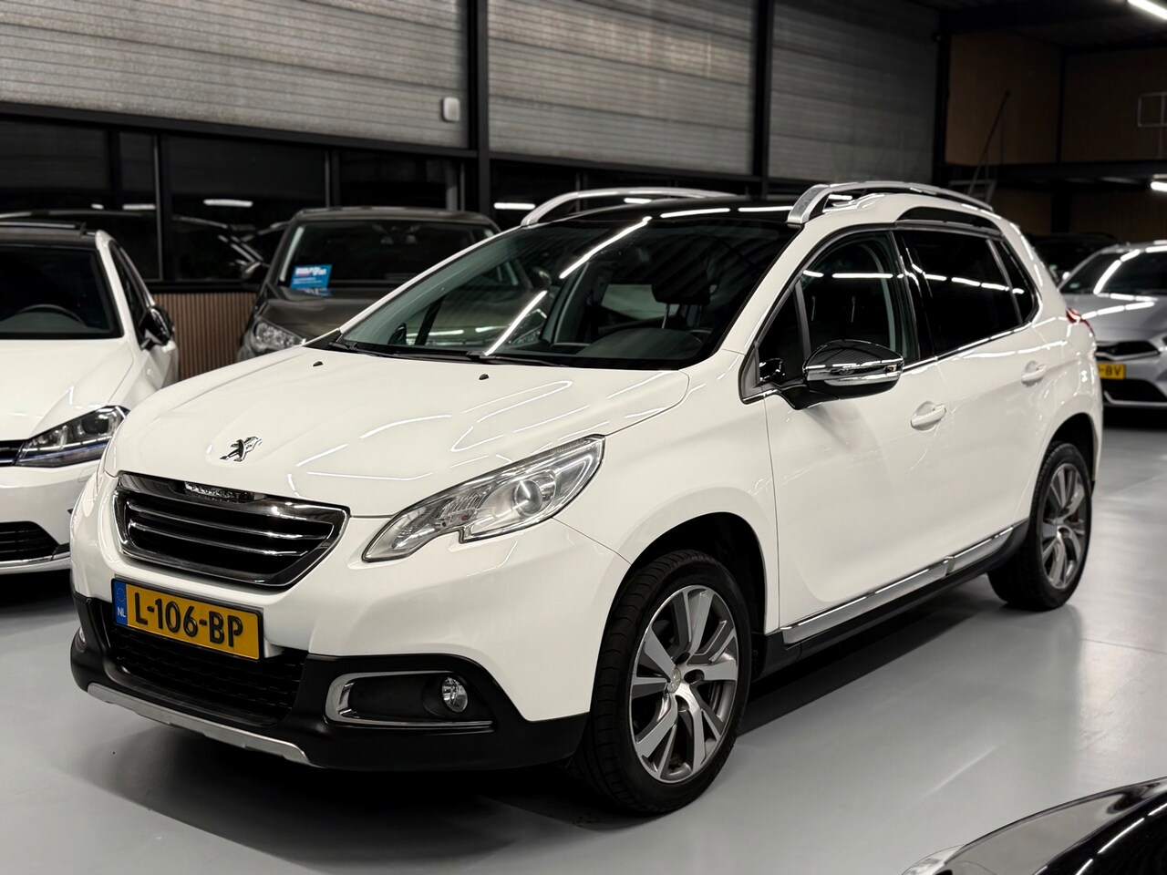 Peugeot 2008 - 1.6 VTi Féline Pano l Leder l Xenon l Full - AutoWereld.nl