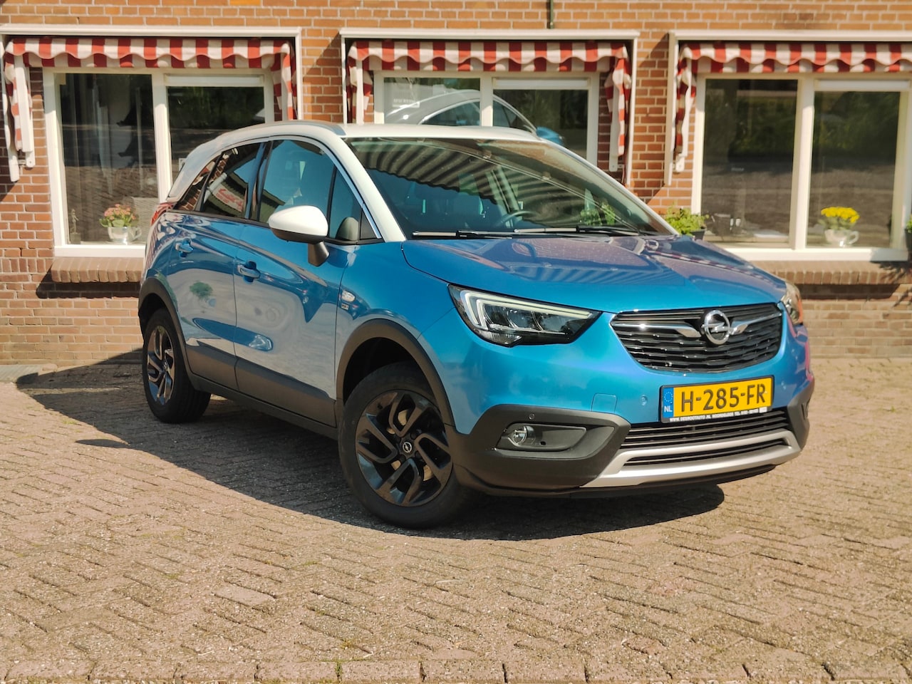Opel Crossland X - 1.2 Turbo 120 Jaar Edition Navi Cruise Clima Carplay Camera - RIJKLAAR - AutoWereld.nl