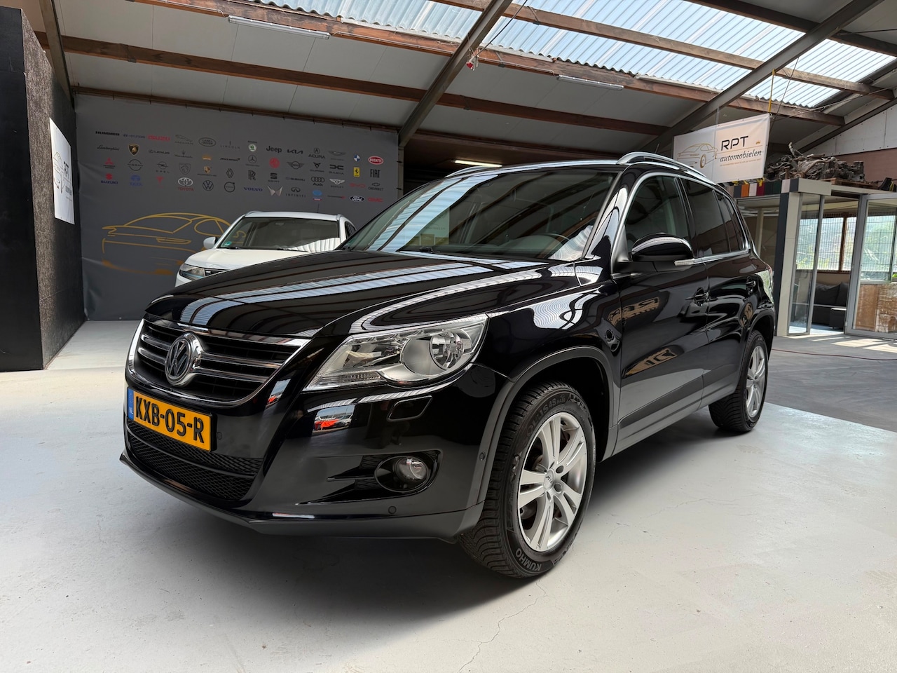 Volkswagen Tiguan - 2.0 TSI Sport&Style 4Motion DSG Automaat - AutoWereld.nl