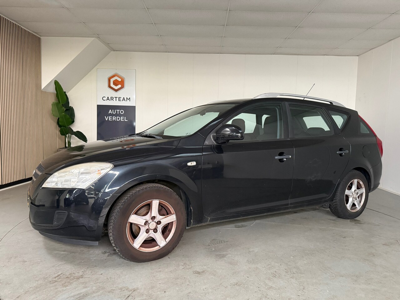 Kia Cee'd Sporty Wagon - 1.4 X-tra ISG Airco, LMV - AutoWereld.nl