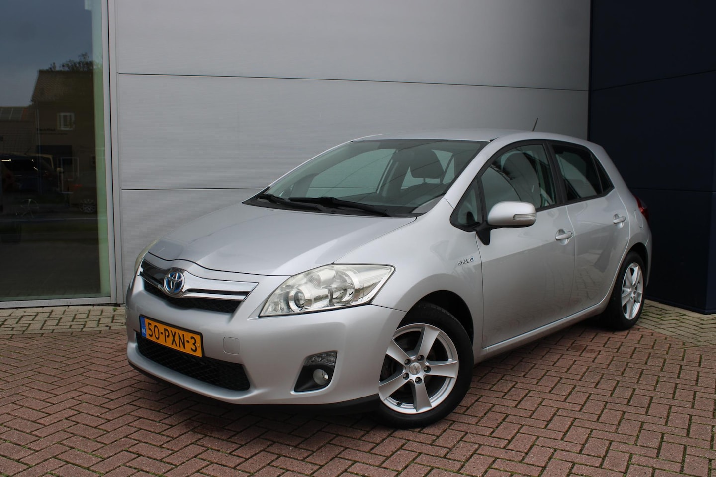 Toyota Auris - 1.8 Full Hybrid Aspiration Automaat Airco Navi Trekhaak Dealer onderhouden - AutoWereld.nl