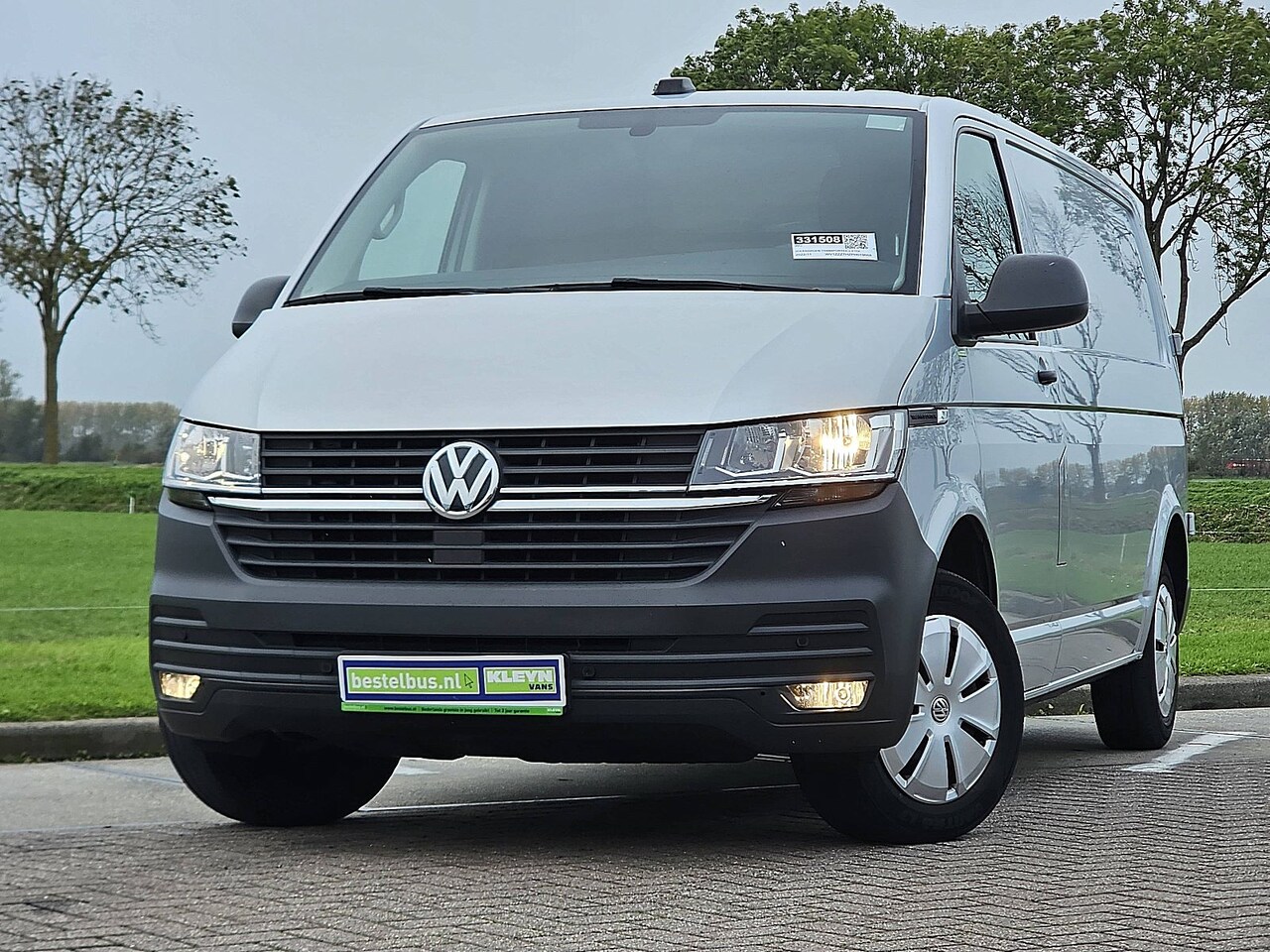 Volkswagen Transporter - 2.0 TDI T6.1 150Pk L2 NAP Carplay Euro6 Airco Voorruitverwarming Onderhoudshistorie Achter - AutoWereld.nl