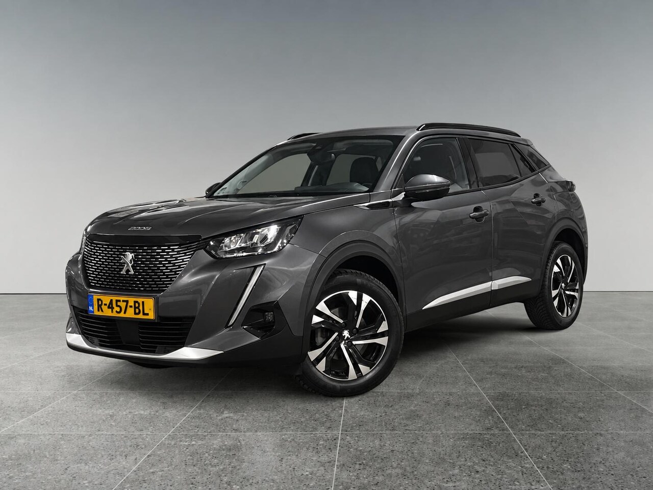 Peugeot 2008 - Allure 1.2 Turbo 130pk | NAVI | STOELVERW. | CAMERA | CLIMA | ALL-SEASONBANDEN | DAB+ | AP - AutoWereld.nl