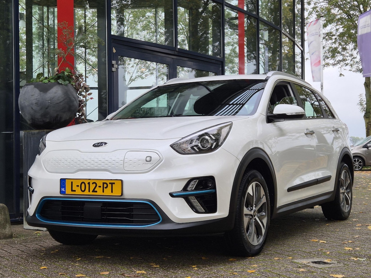 Kia e-Niro - ComfortLine 64 kWh | SOH 98,6% | Trekhaak | Navigatie | PDC + Camera | Climate control | A - AutoWereld.nl