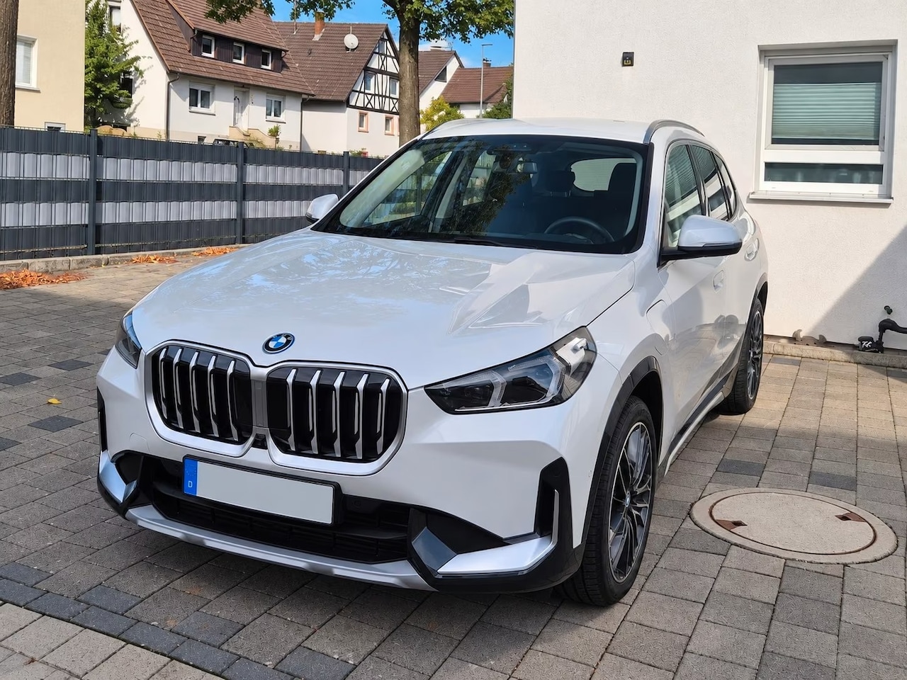 BMW X1 - xDrive25e xLine Harman-Kardon HUD Elek Stoelverstelling Keyless Entry 19 Inch Driving Assi - AutoWereld.nl