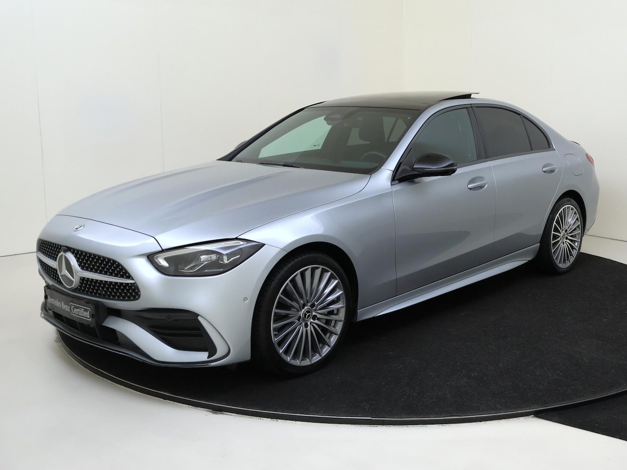 Mercedes-Benz C-klasse - 300 e Business Solution AMG / Panoramadak / Multispaaks-velgen / Memory-Stoelen / 360Grade - AutoWereld.nl