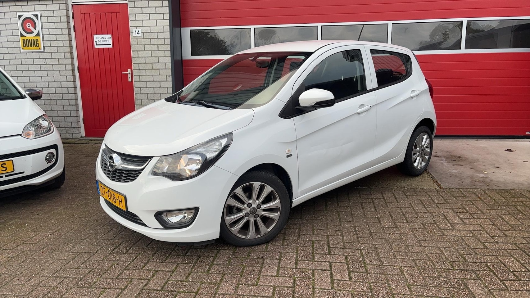 Opel Karl - 1.0 ecoFLEX 120 Jaar Edition CRUISE / PDC / LMV / BLUETOOTH / ELEK RAMEN / AIRCO / NL-AUTO - AutoWereld.nl