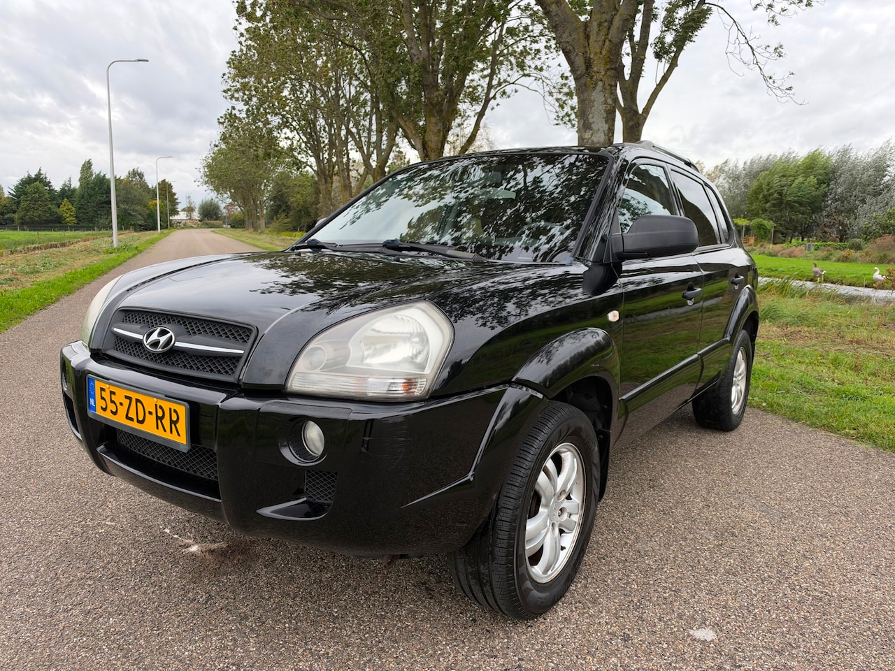 Hyundai Tucson - 2.0i Active Joy|clima|cruise|trekhaak|nap - AutoWereld.nl