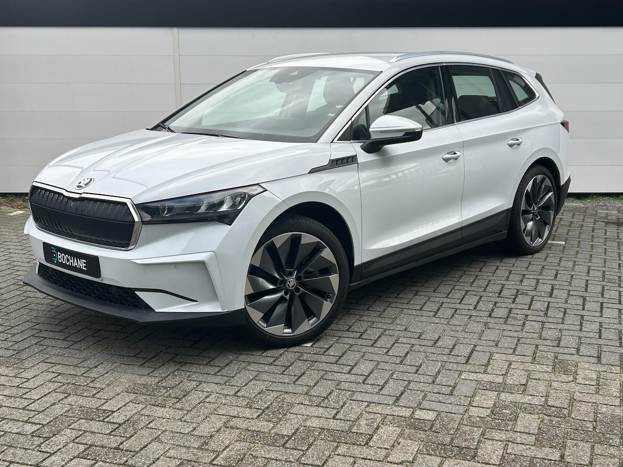 Skoda Enyaq iV - 80 First Edition | 92,6% SoH | Navigatie | Camera | Verwarmbaar Stuurwiel | Lederen Bekled - AutoWereld.nl