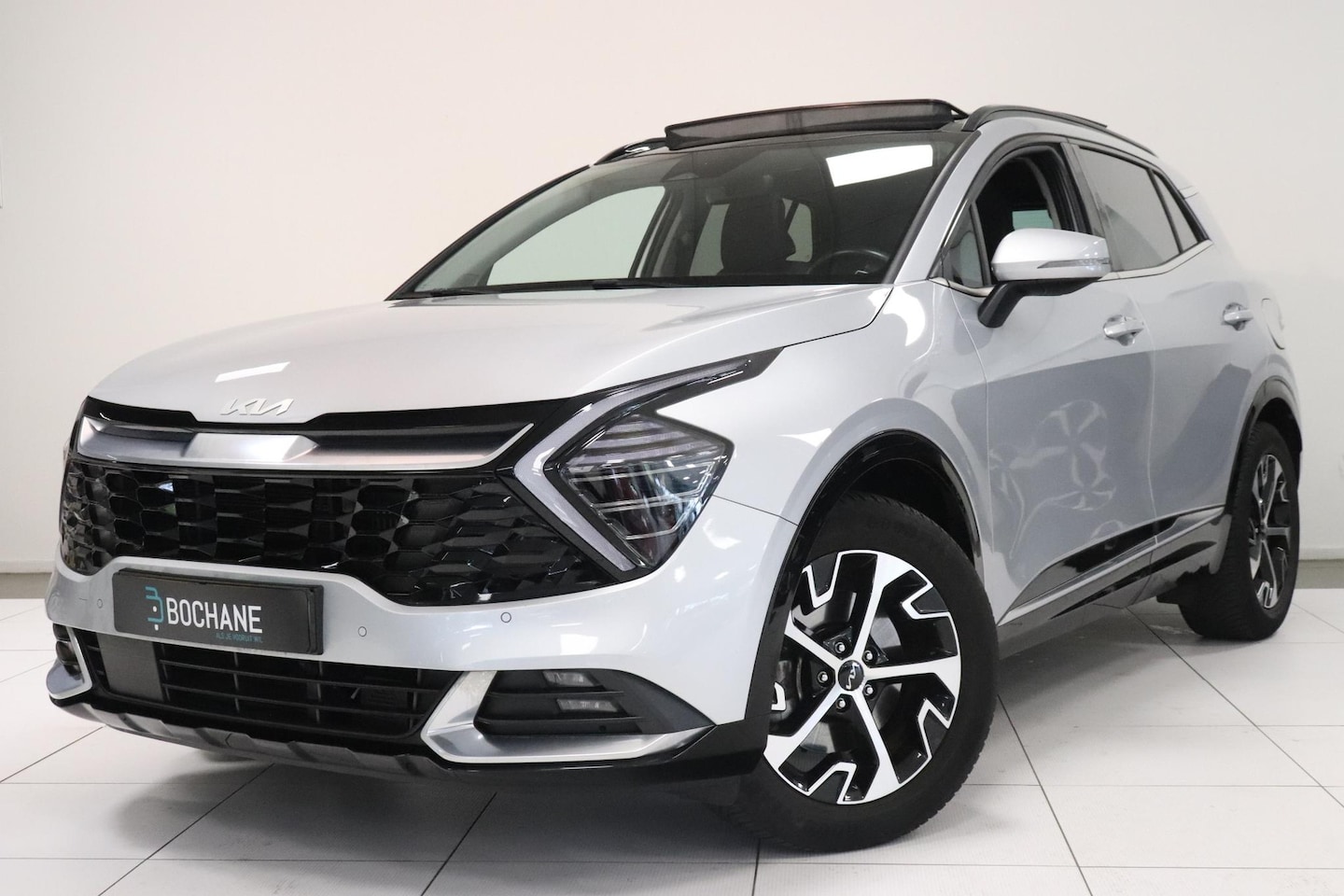 Kia Sportage - 1.6 T-GDi Hybrid DynamicPlusLine | Panoramadak | Camera | Adaptieve cruise | Navigatie | S - AutoWereld.nl