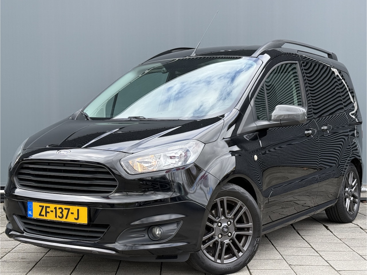 Ford Tourneo Courier - BWJ 2018 | 1.0 101PK Titanium | CLIMA | NAVI | STOELVERW | LICHTMETAAL | PDC | - AutoWereld.nl