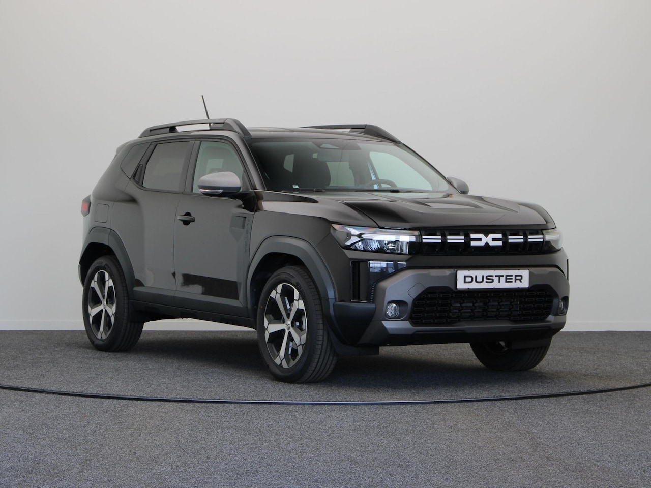 Dacia Duster - 1.8 hybrid 155pk limited edition | Stoel- en stuurwielverwarming | Voorruitverwarming | 36 - AutoWereld.nl