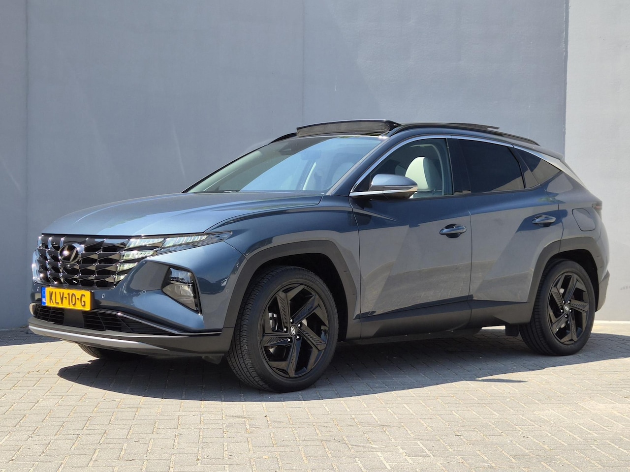 Hyundai Tucson - 1.6 T-GDI PHEV Premium Sky 4WD / Glazen schuif- en kanteldak / Rondomzicht camera / Trekge - AutoWereld.nl