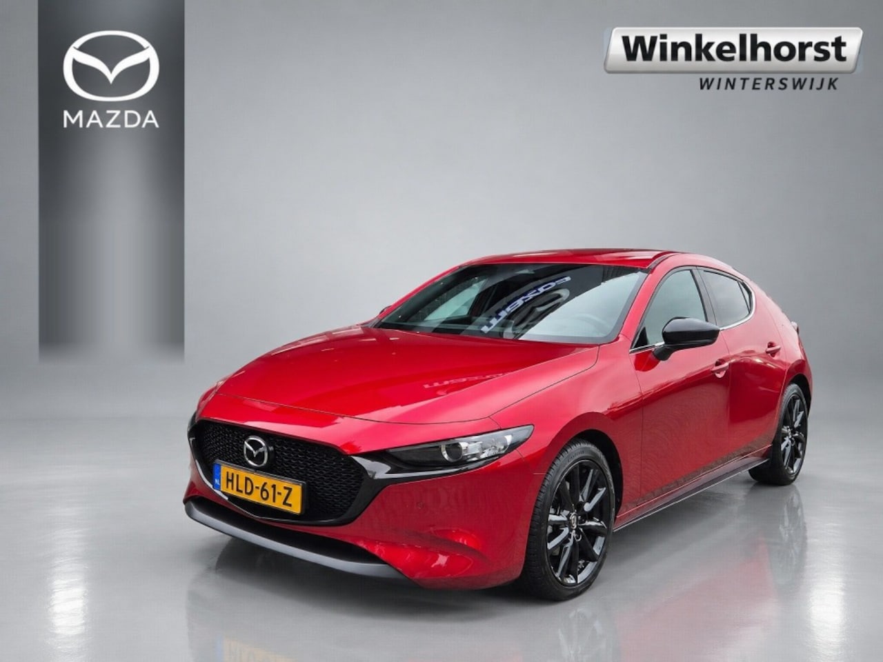 Mazda 3 - E-SKYACTIV G 2.0 150 6MT HOMURA M-HYBRID / Trekhaak - AutoWereld.nl