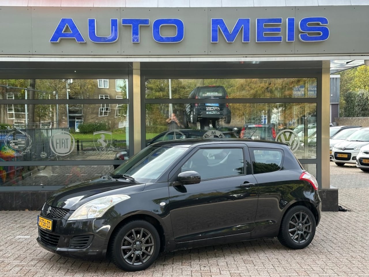 Suzuki Swift - 1.2 Base Airco Trekhaak - AutoWereld.nl