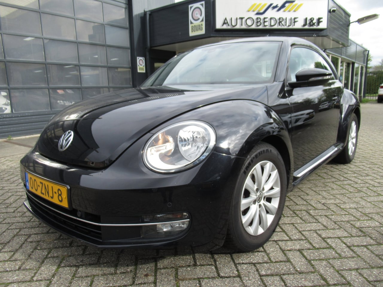 Volkswagen Beetle - 1.2 TSI Design / 1e EIG / NAV / PDC / Climate / Cruise Control - AutoWereld.nl