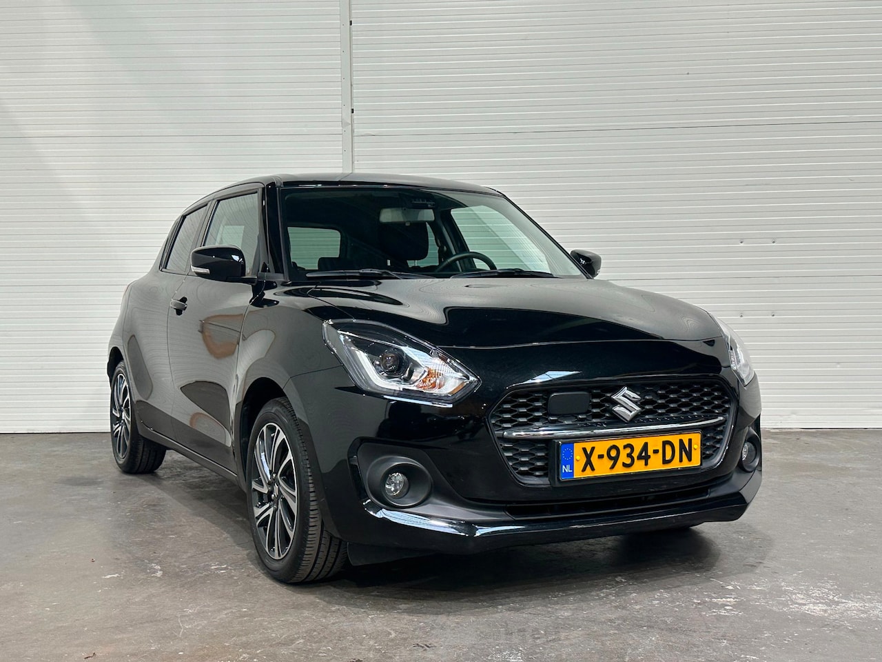 Suzuki Swift - 1.2 Style Smart Hybrid keyless / LMV / Trekhaak - AutoWereld.nl