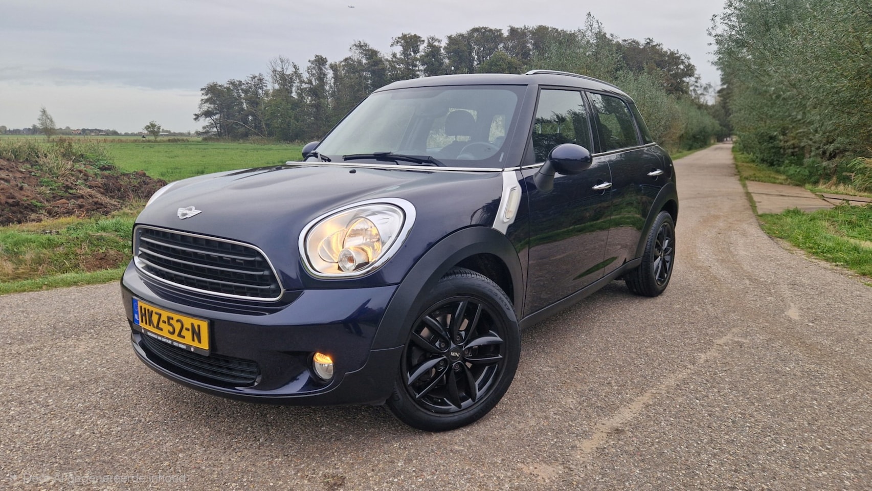 MINI Countryman - 1.6 One Business Line / Airco / Apple Carplay-Android Auto-Navigatie / Radio-CD / PDC / LM - AutoWereld.nl