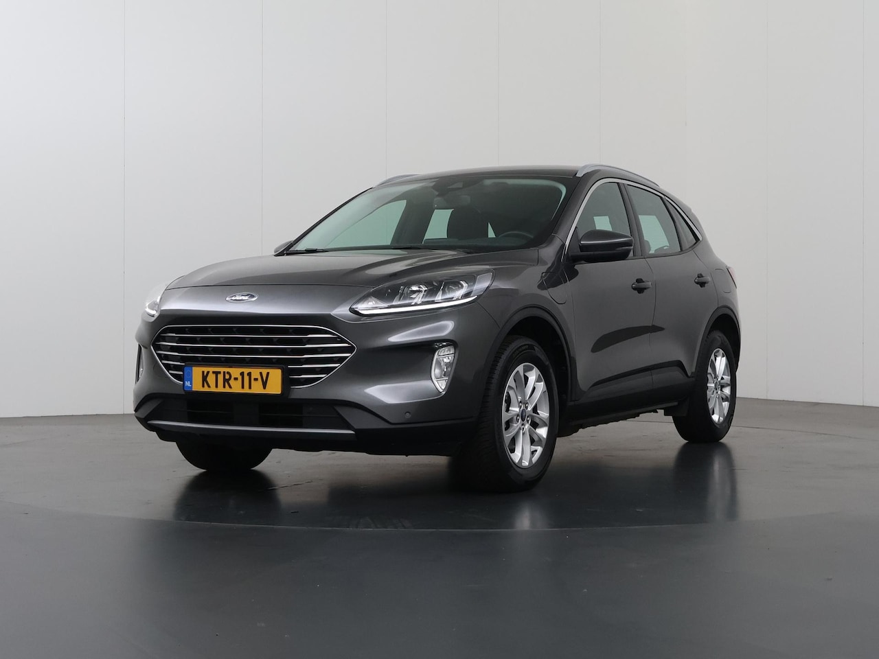 Ford Kuga - 2.5 PHEV Titanium | SOH 90.2% | Cruise Control | Climate Control |  Achteruitrijcamera | C - AutoWereld.nl