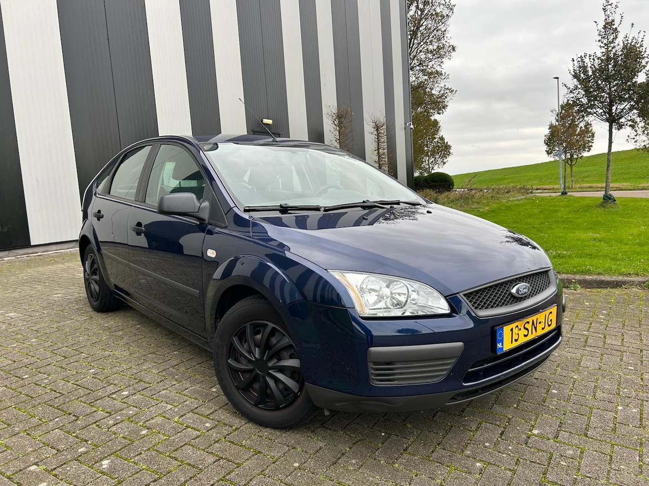 Ford Focus - 1.6-16V Champion 2e Eigenaar-Lage Km-Airco-Cruise-Elekpakket - AutoWereld.nl