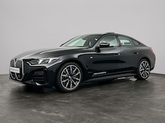 BMW i4 - eDrive35 70 kWh M-Sport | Trekhaak | Schuifdak | Stoelverwarming | Stuurverwarming | Hifi
