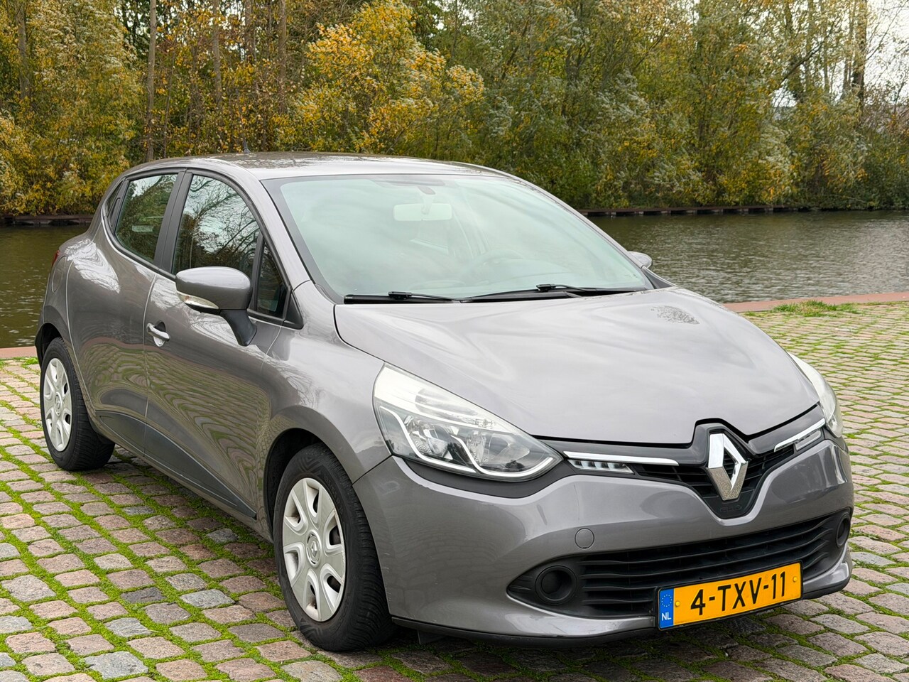 Renault Clio - 0.9 TCe Expression 1e eigenaar airco elektrische ramen cruise control cv op afstand - AutoWereld.nl