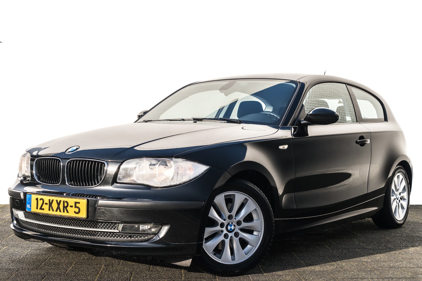 BMW 1-serie - 118d Business Line | Trekhaak | Airco | Navi | Org. NL - AutoWereld.nl
