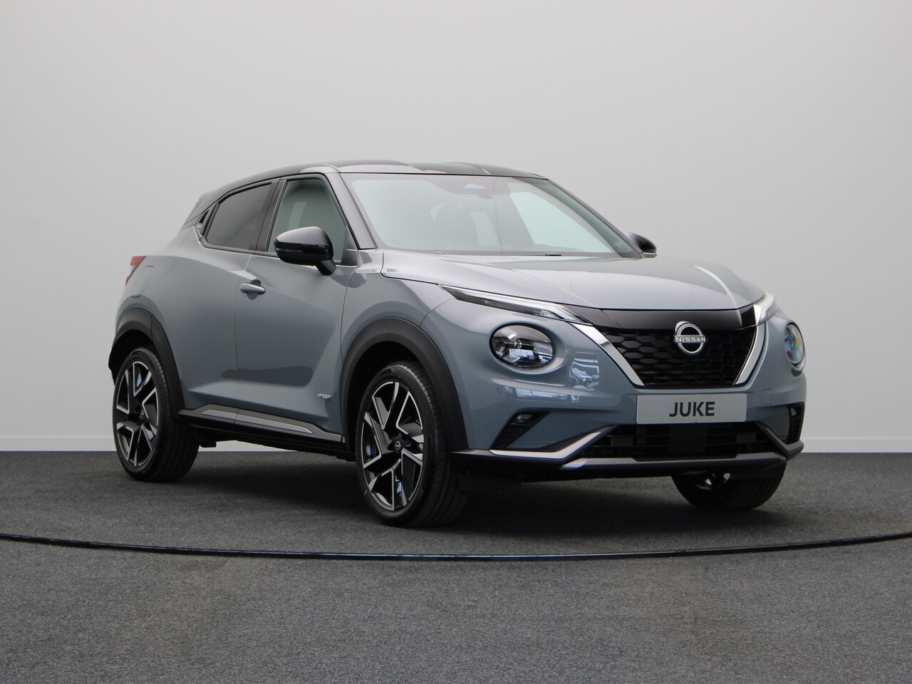 Nissan Juke - N-Design Enigma Black + Cold Pack Hybrid 143 | 17" Lichtmetalen velgen | 19" lichtmetalen - AutoWereld.nl