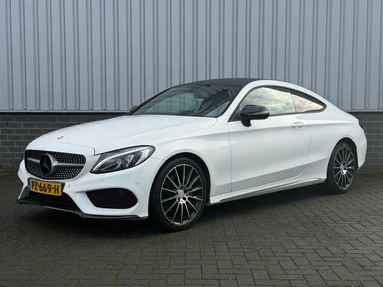 Mercedes-Benz C-klasse Coupé - 180 Prestige |AUTOMAAT|AMG|LEDER| - AutoWereld.nl
