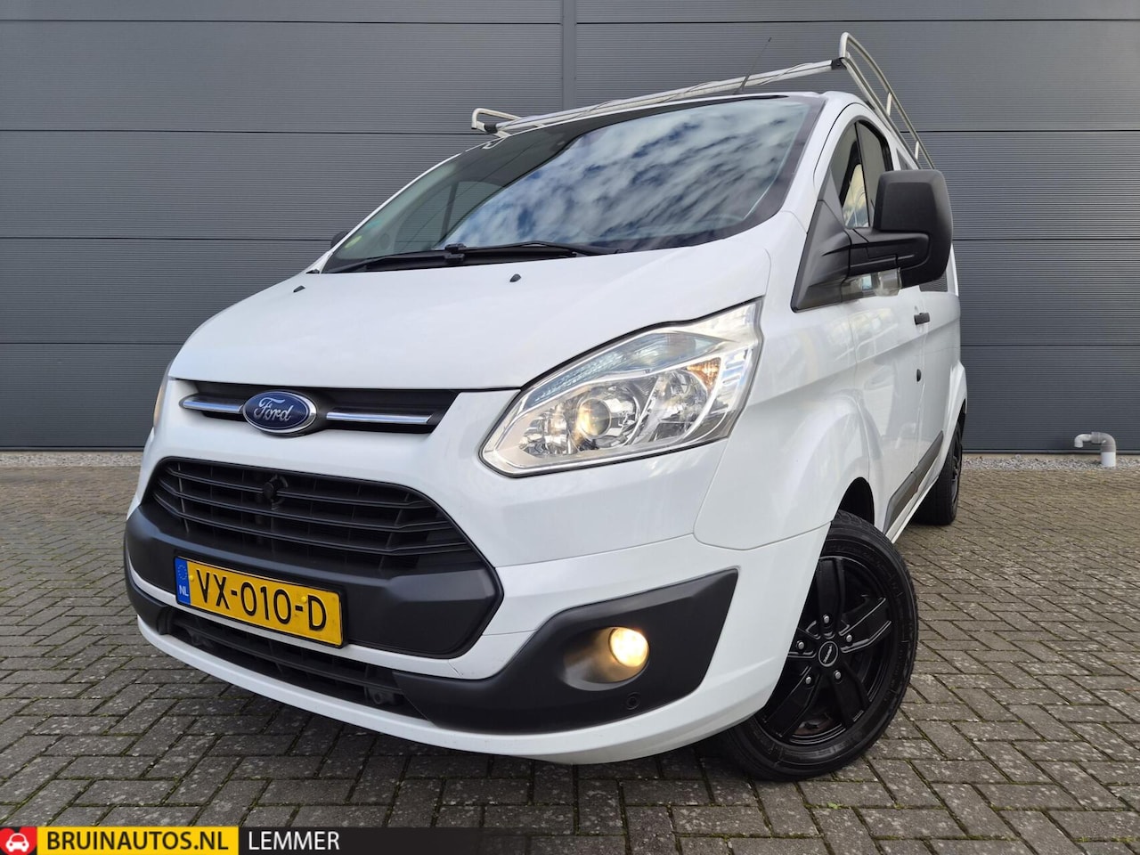 Ford Transit Custom - 2.2 TDCI L2H1 DC Airco Navi Trekh Imperiaal - AutoWereld.nl