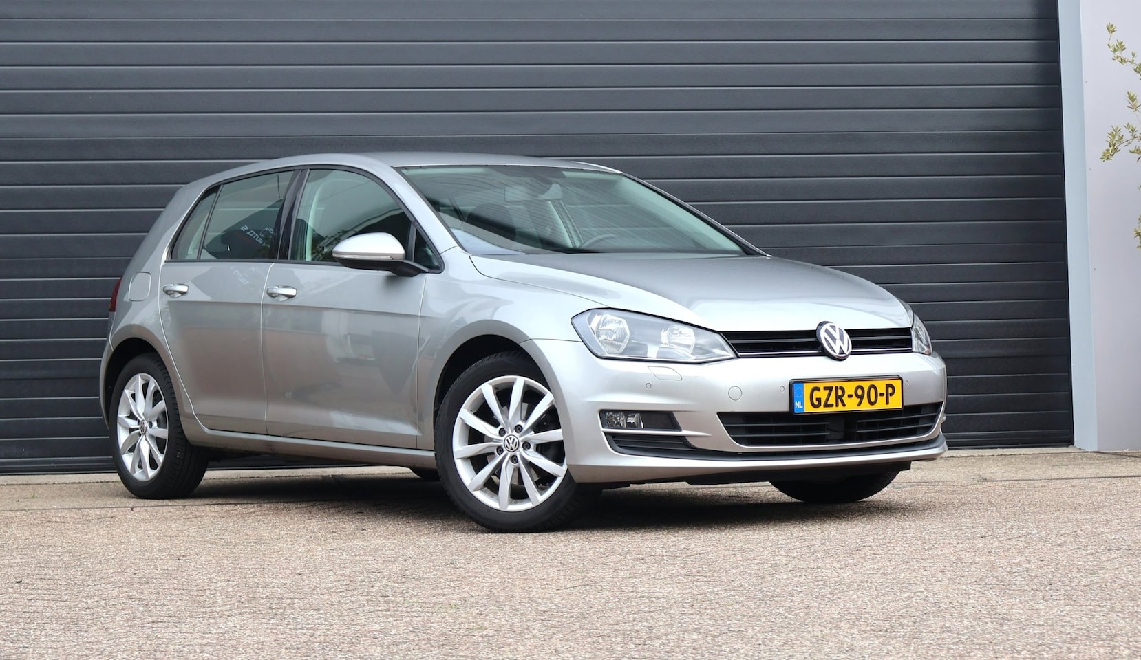 Volkswagen Golf - 1.2 TSI Highline PDC/Navi/Cruise/stoelverwarming - AutoWereld.nl