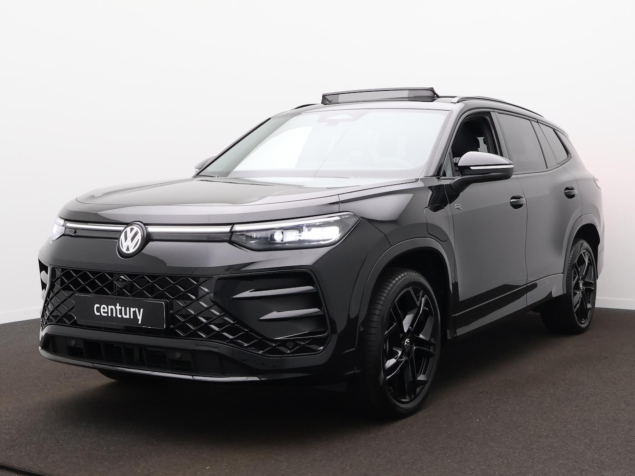 Volkswagen Tayron - 1.5 eHybrid R-Line Edition / Pano-Dak / Trekhaak wegklapbaar / Camera - AutoWereld.nl