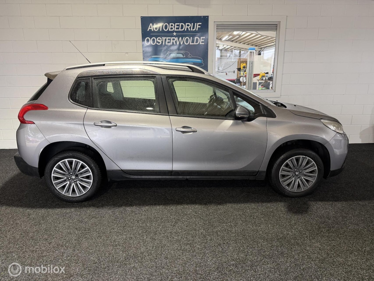 Peugeot 2008 - 1.2 PureTech Style Apk - Airco - Achteruitrijcamera - Cruise