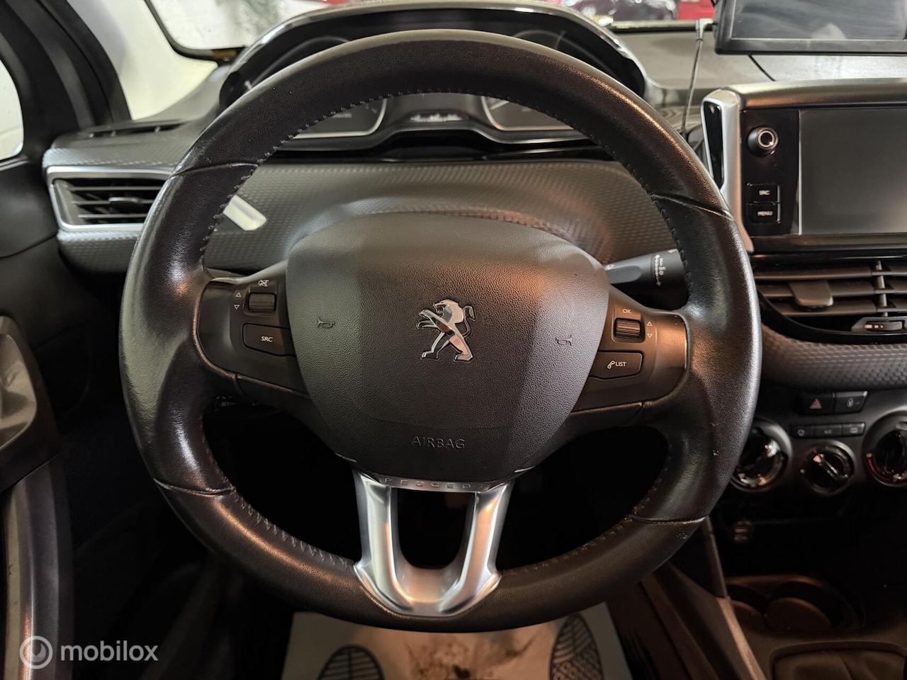 Peugeot 2008 - 1.2 PureTech Style Apk - Airco - Achteruitrijcamera - Cruise