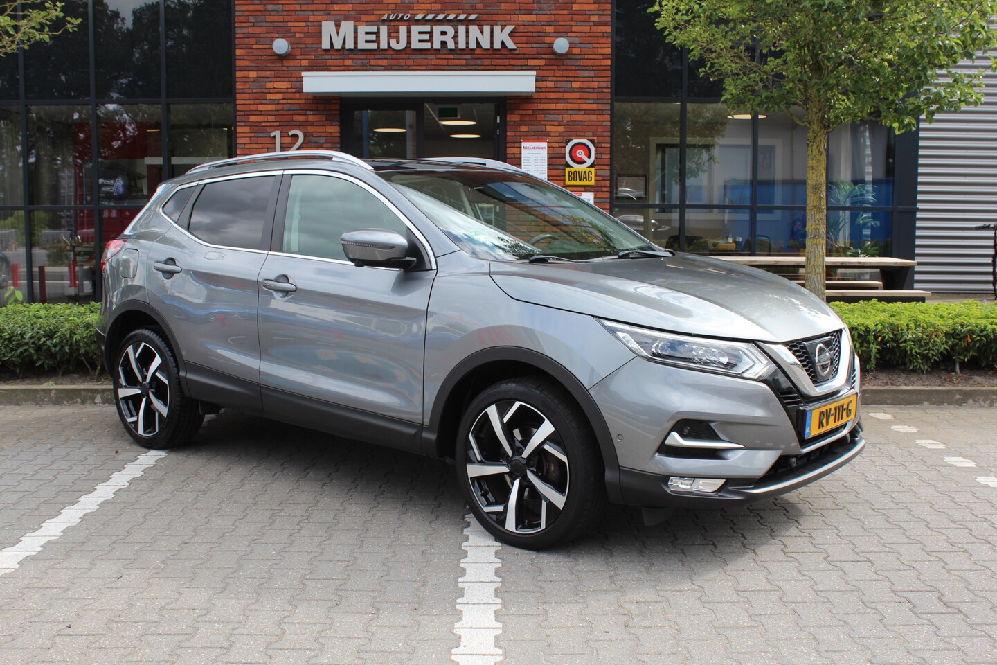 Nissan Qashqai - 1.2 Tekna + 360 graden camera, Panoramadak. - AutoWereld.nl