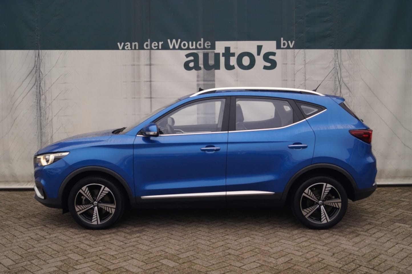 MG MG ZS EV - Luxury 45 kWh -SOH89%-PANO-LEER-NAVI- - AutoWereld.nl