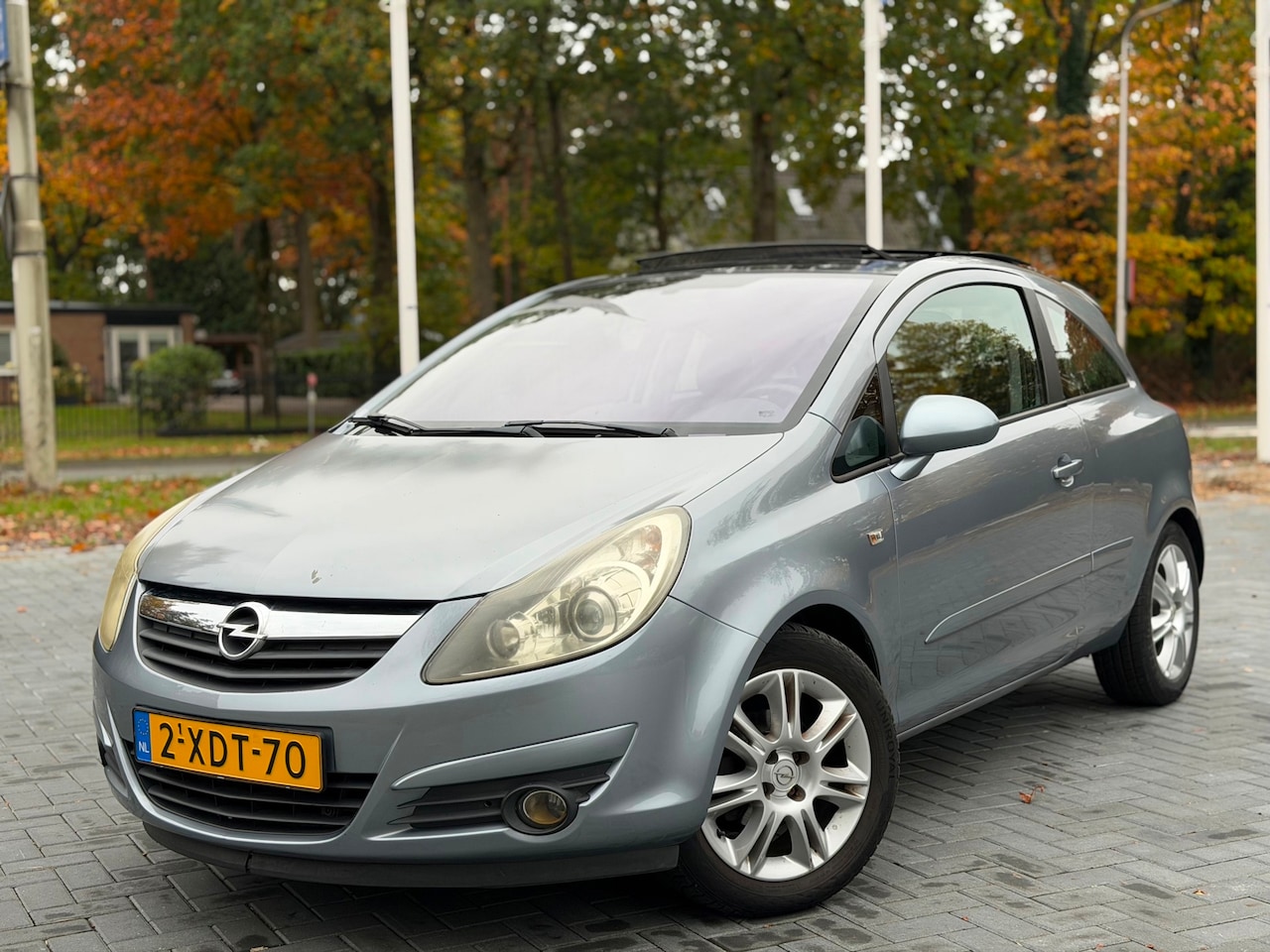 Opel Corsa - 1.4-16V Cosmo Automaat/Pano/Airco/Cruise/PDC/LMV - AutoWereld.nl
