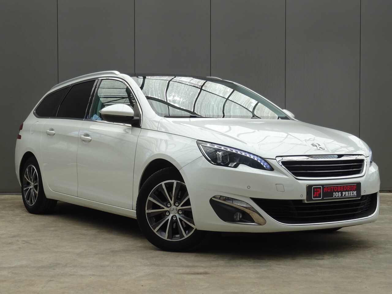Peugeot 308 SW - 1.6 BlueHDI Blue Lease Premium * LEER * PANORAMADAK !! - AutoWereld.nl