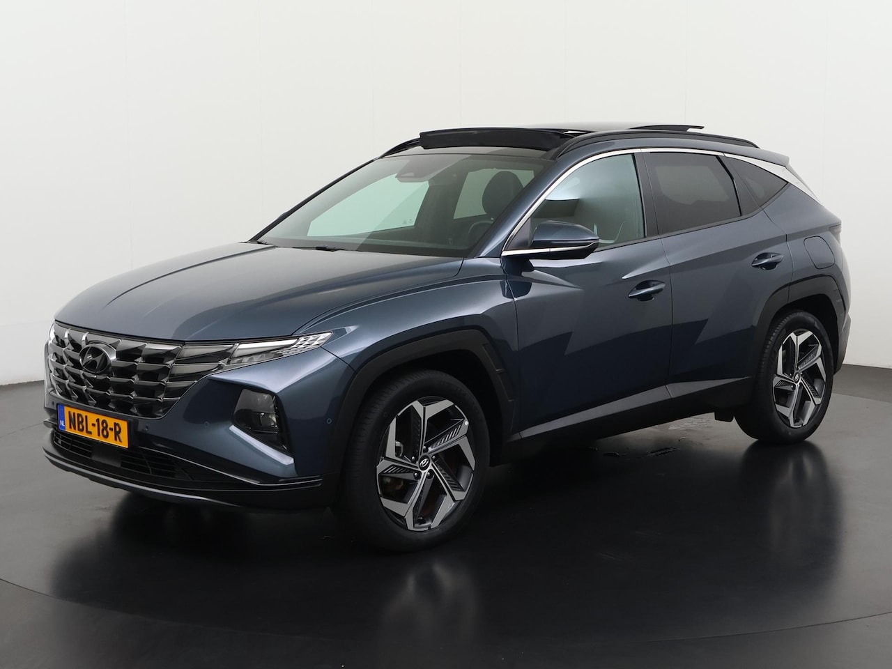 Hyundai Tucson - 1.6 T-GDI PHEV Premium Sky 4WD | All-in 663,- Private Lease | Direct uit voorraad - AutoWereld.nl