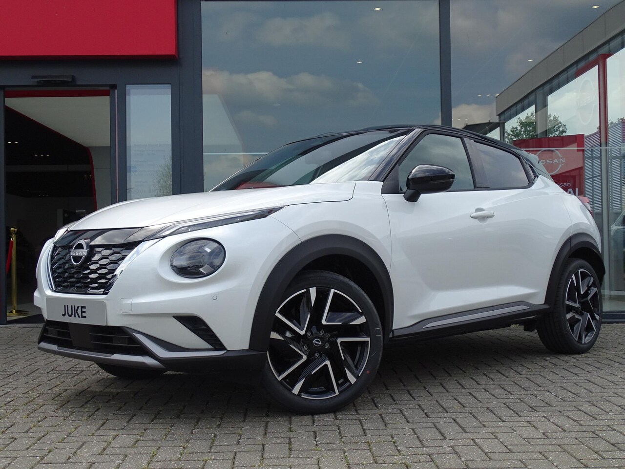 Nissan Juke - 1.6 Hybrid N-Design 10 jr garantie! | COLD PACK | TWO TONE PARELMOER LAK - AutoWereld.nl