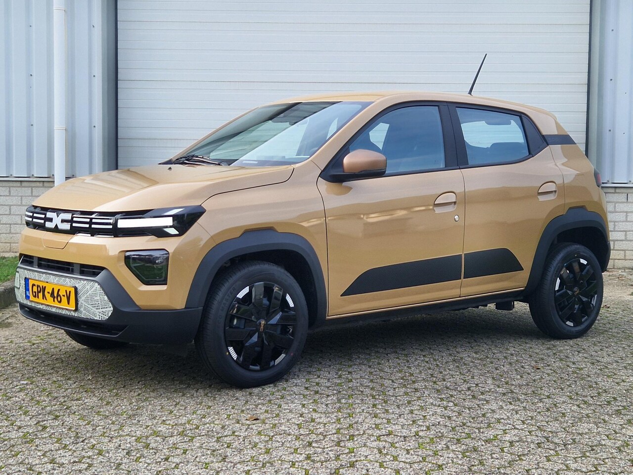 Dacia Spring - Extreme 65PK 27 kWh / Airco / DAB Radio / Navigatie / Apple Carplay & Android Auto / Achte - AutoWereld.nl