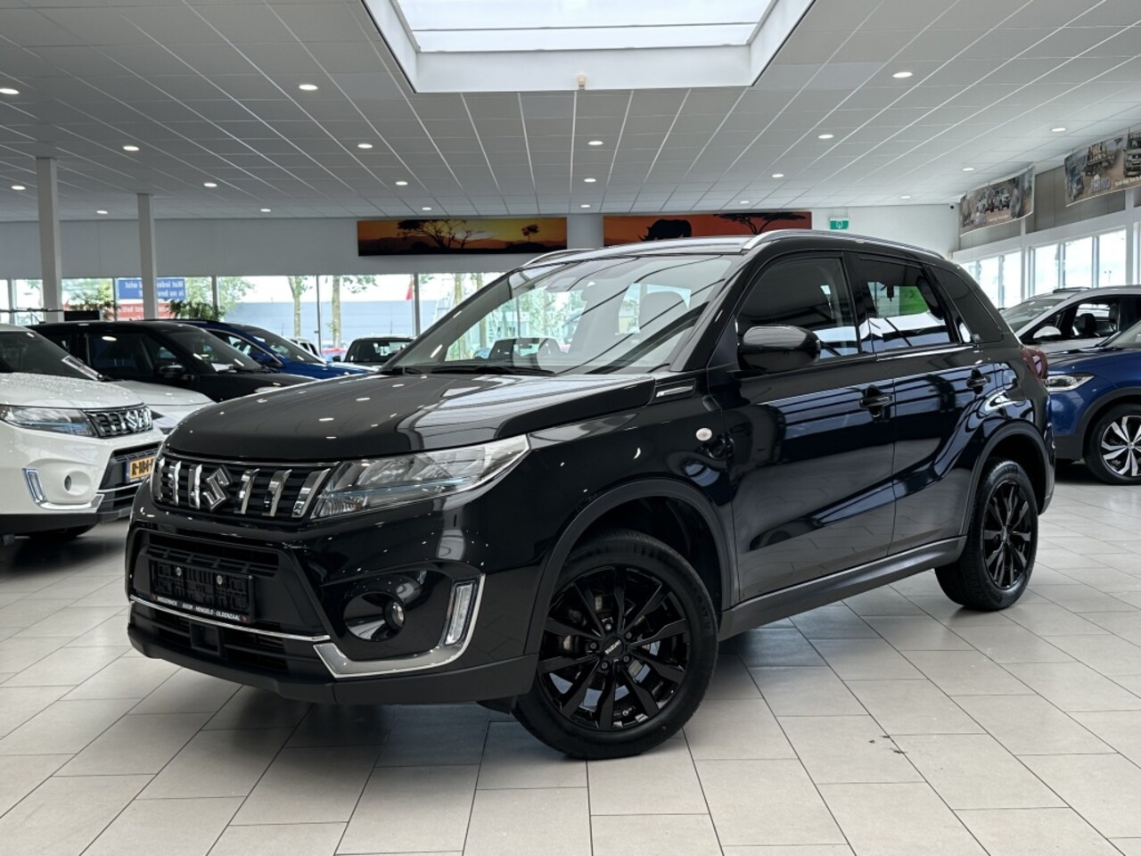 Suzuki Vitara - 1.4 Boosterjet Select Hybride [ 17"inc ZWARTE VELGEN I CAMERA I NAVI I ADAPTIEVE CRUIS ] - AutoWereld.nl
