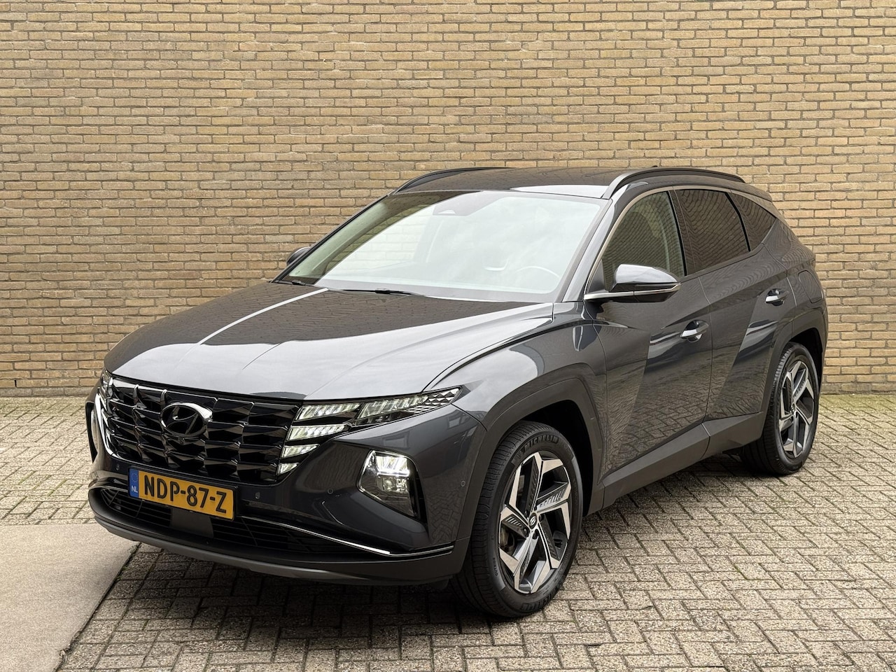 Hyundai Tucson - 1.6 T-GDI 265pk PHEV Premium 4WD | Trekhaak afneembaar | Lederen bekleding | 360 camera | - AutoWereld.nl
