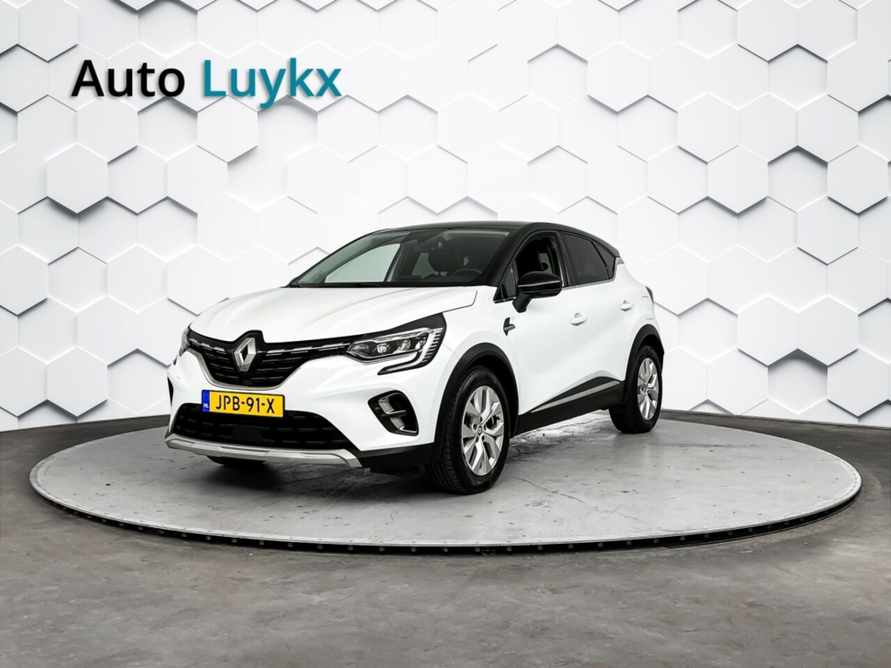 Renault Captur - 1.6 E-Tech PHEV 160 Intens | Groot Scherm + Navigatie | Parkeercamera | Cruise Control - AutoWereld.nl