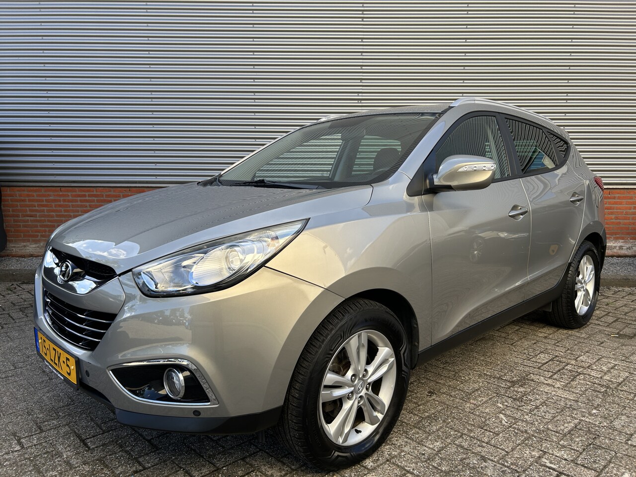 Hyundai ix35 - 2.0i Business Edition | Automaat | Trekhaak | Goed onderhouden | Camera | - AutoWereld.nl