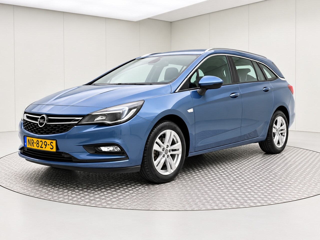 Opel Astra Sports Tourer - 1.0 Edition | Dealer onderhouden | Trekhaak | Climate control | Navigatie | Carplay | Pdc - AutoWereld.nl