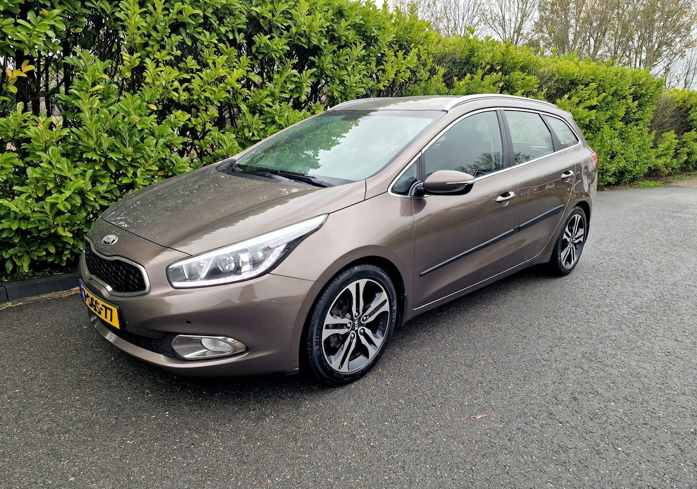 Kia Cee'd Sportswagon - 1.6 GDI Navi Airco Trekhaak - AutoWereld.nl