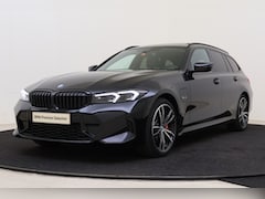 BMW 3-serie Touring - 320e M Sport Automaat / Panoramadak / Sportstoelen / Comfort Access / Adaptieve LED / Harm