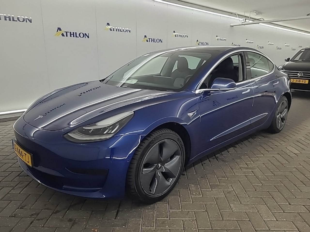 Tesla Model 3 - Standard Plus RWD Standard Range Plus 84,1% SoH [ TREKHAAK+AUTOPILOT+CAMERA+CLIMAAT+NAVIGA - AutoWereld.nl
